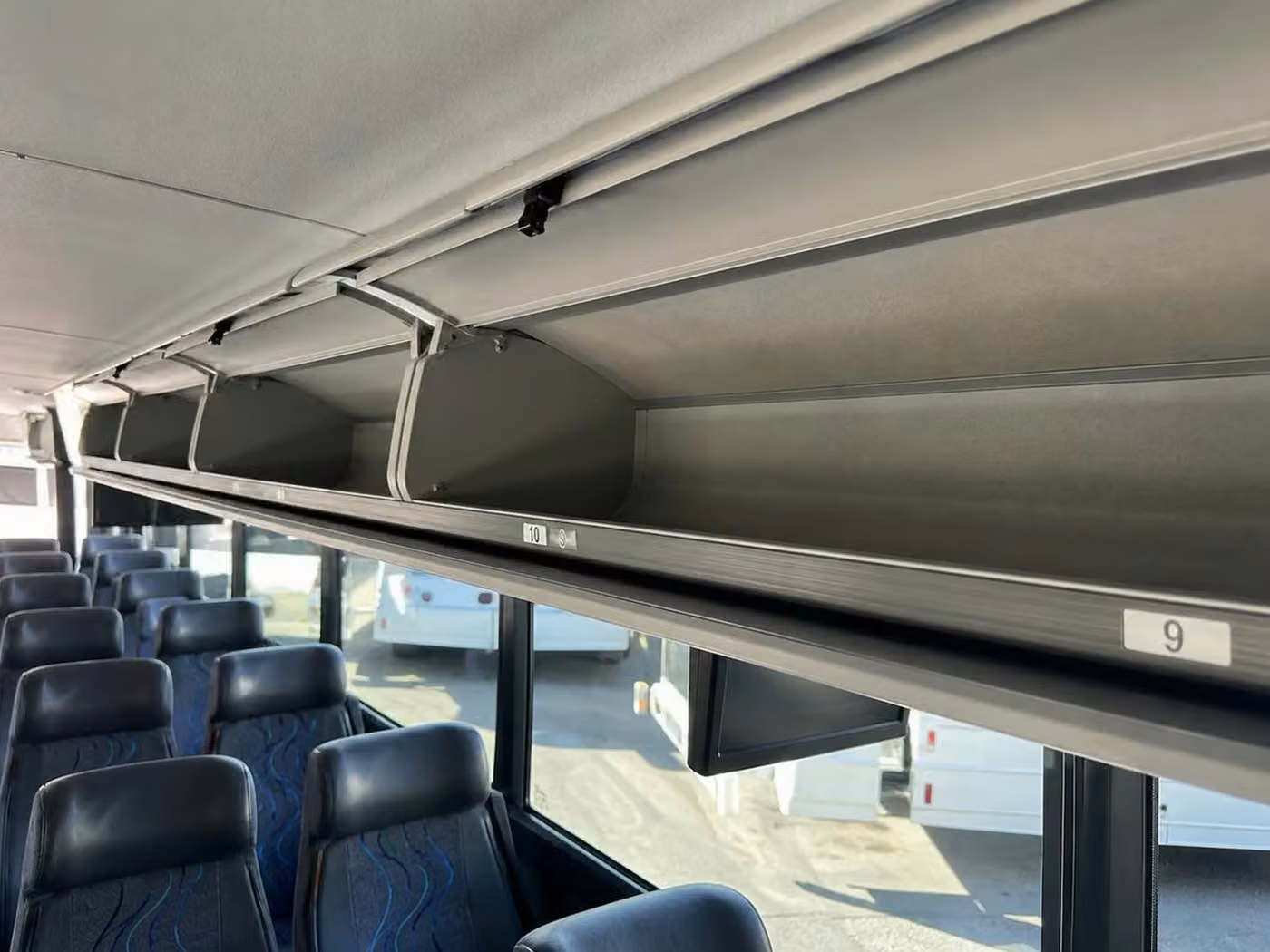 pooler 18 passenger minibus overhead storage