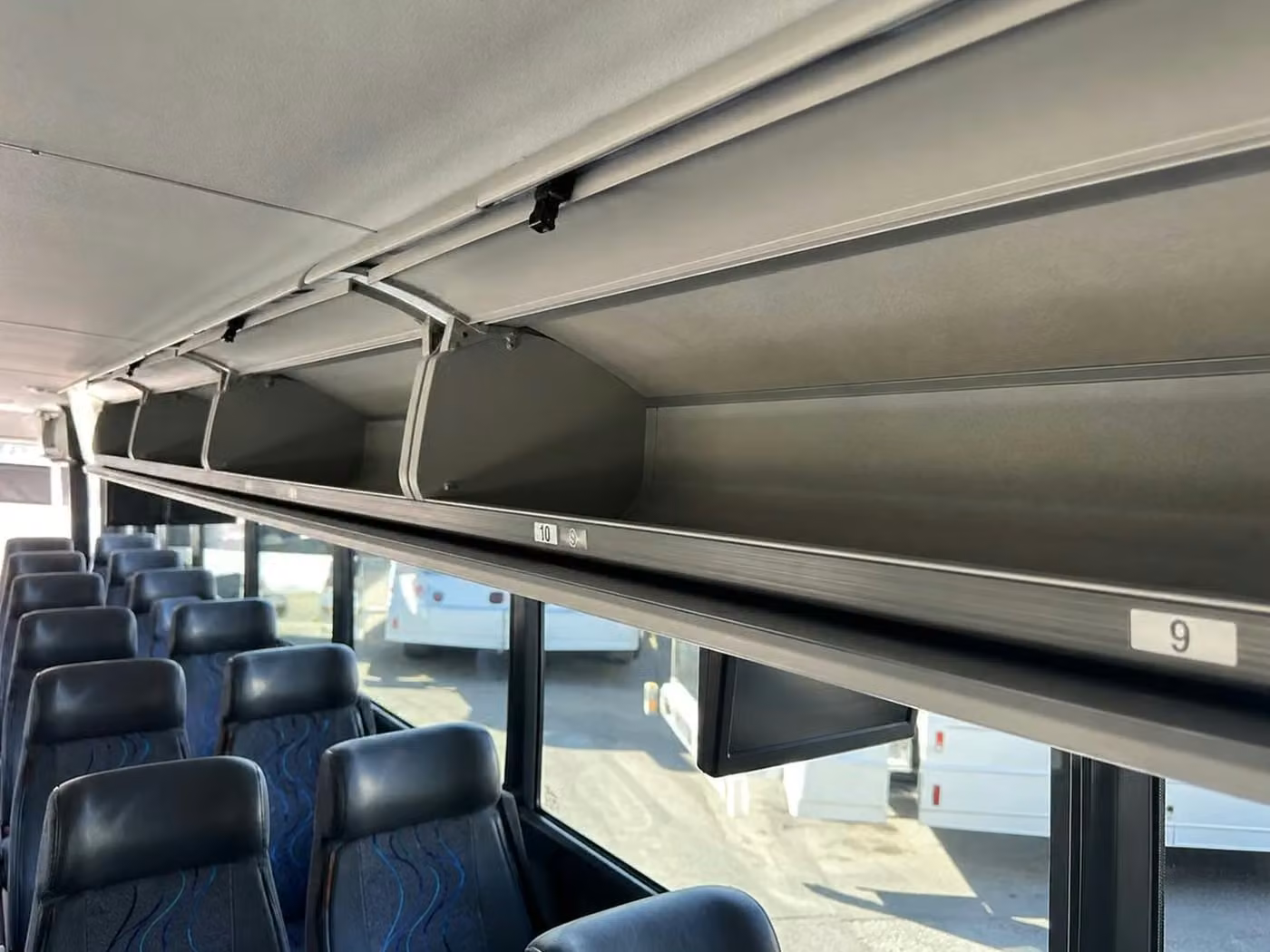 pooler 28 passenger minibus overhead storage