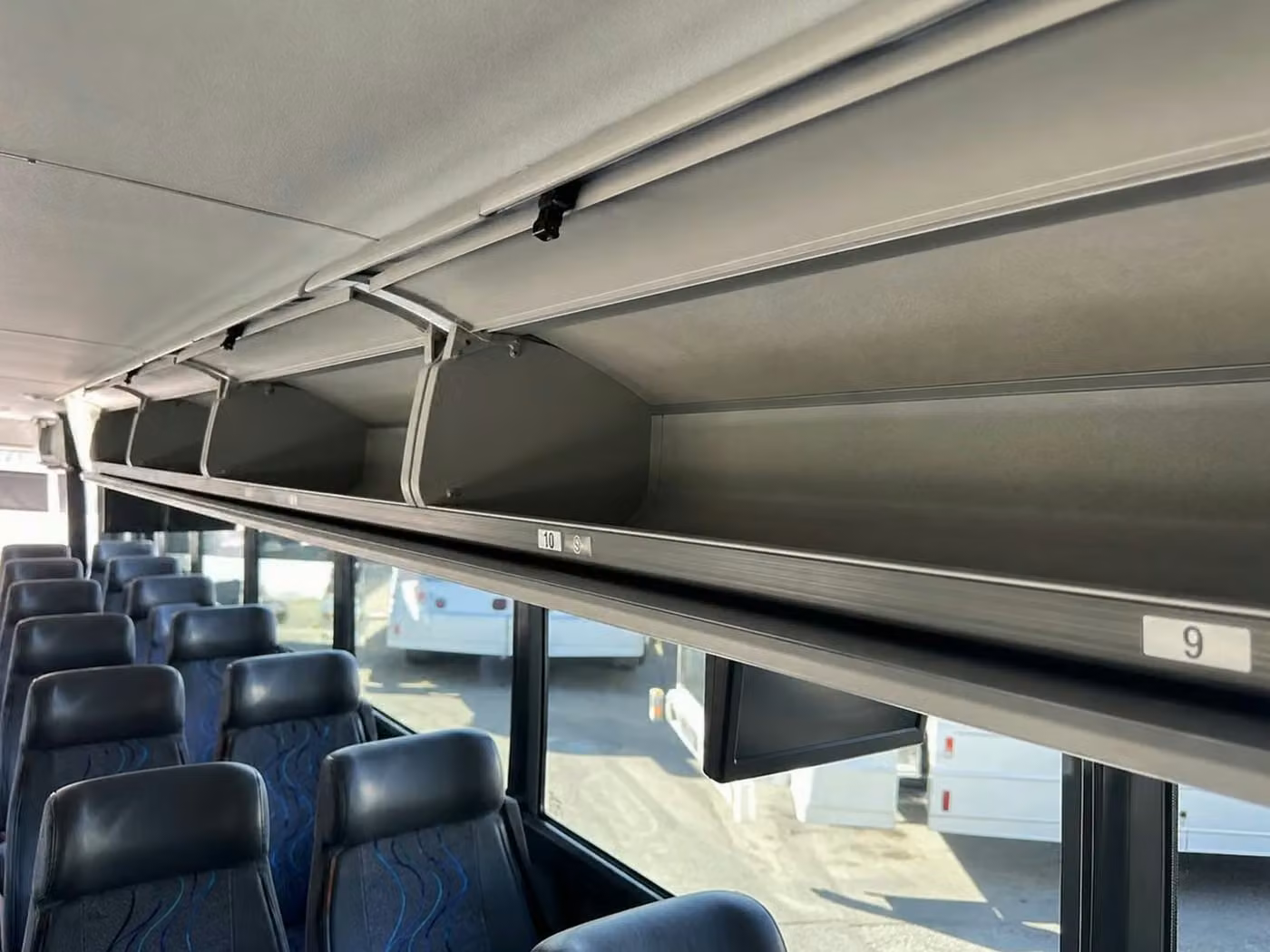 pooler 35 passenger minibus overhead storage