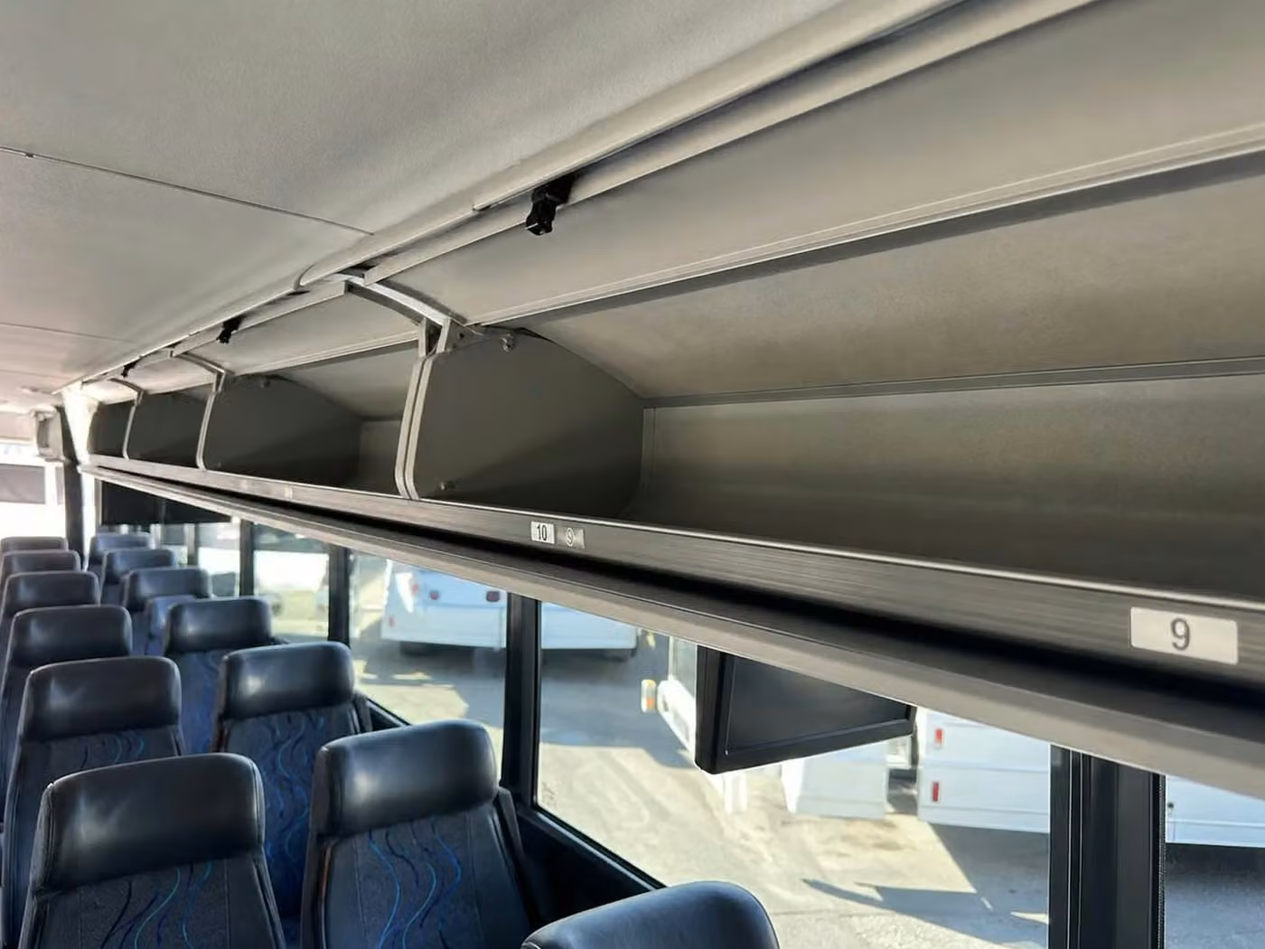 pooler charter bus overhead storage