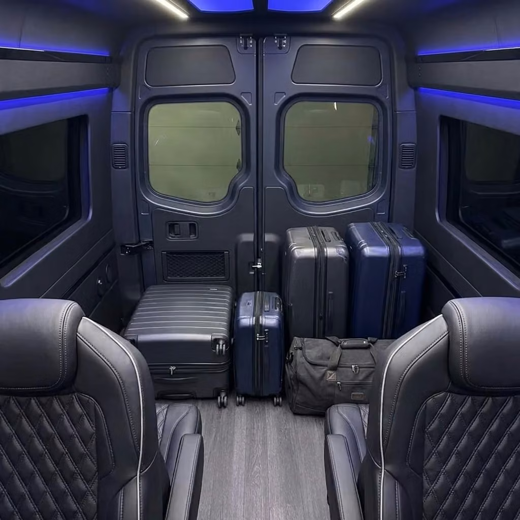 pooler sprinter van rental with driver luggage area